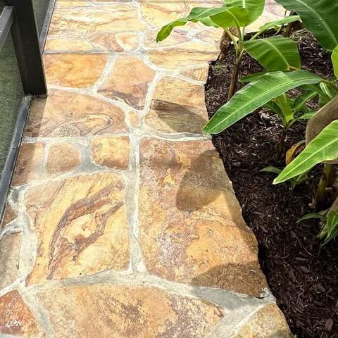 Clean flagstone walkway after pressure washing